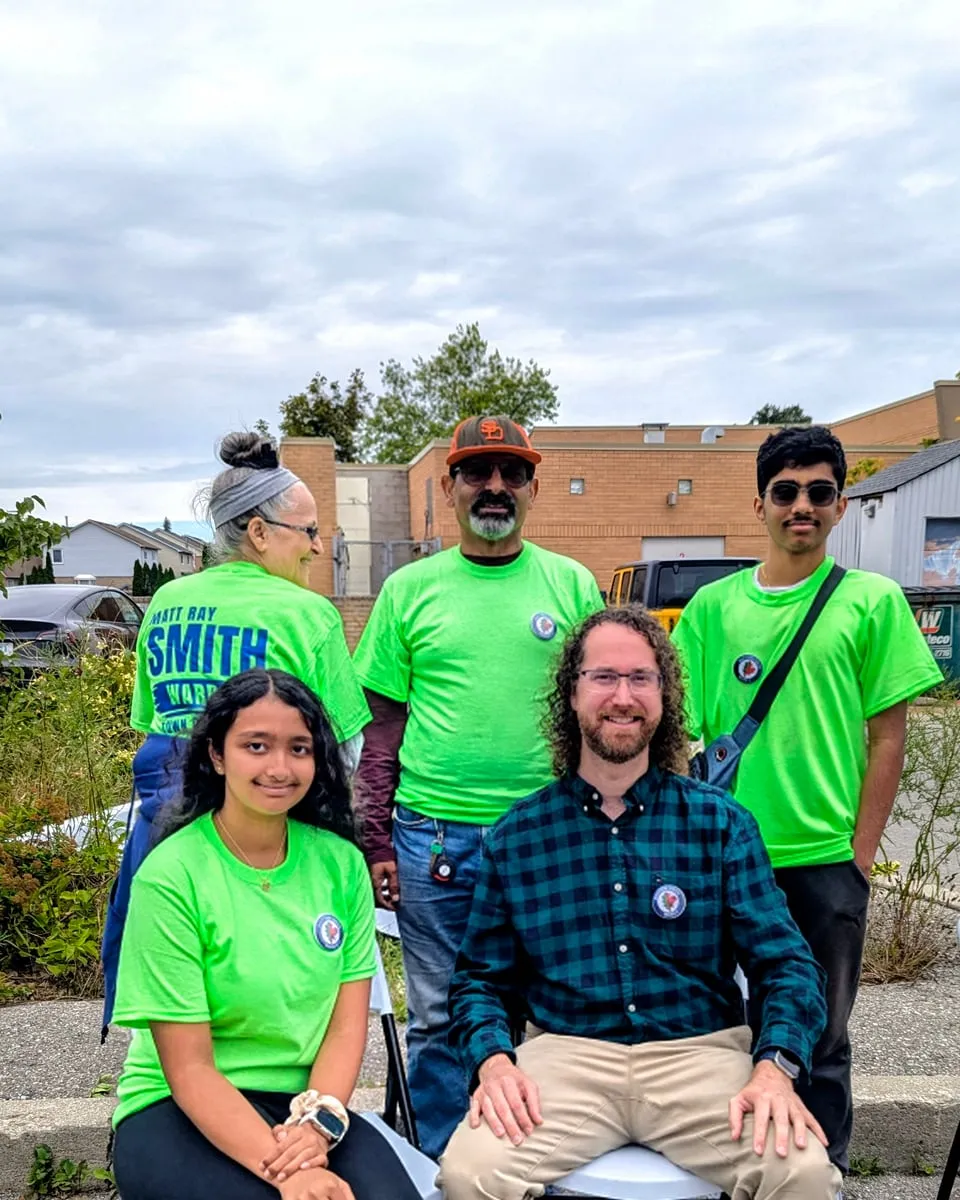 Matt with volunteers in green Smith campaign shirts